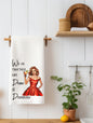 White towel hanging on wooden rack with retro woman illustration and text We go together like Drunk & Disorderly